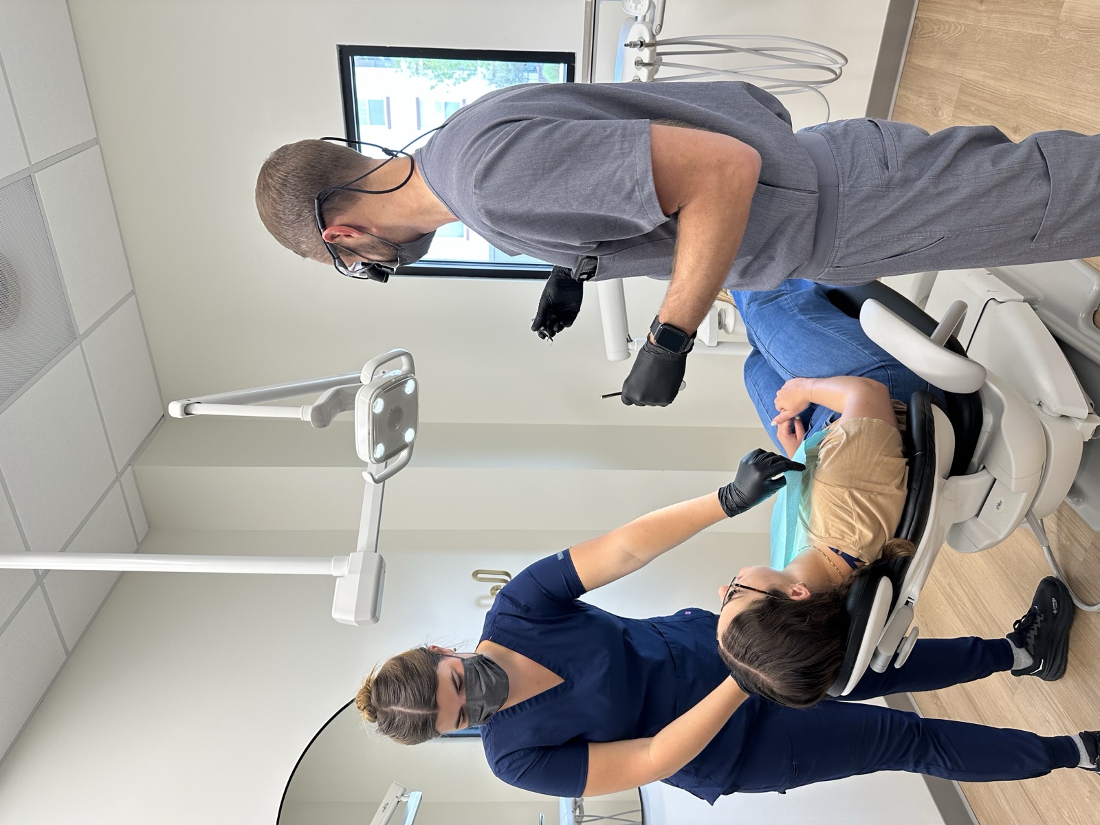 The Tänder surgical team preparing a patient for treatment